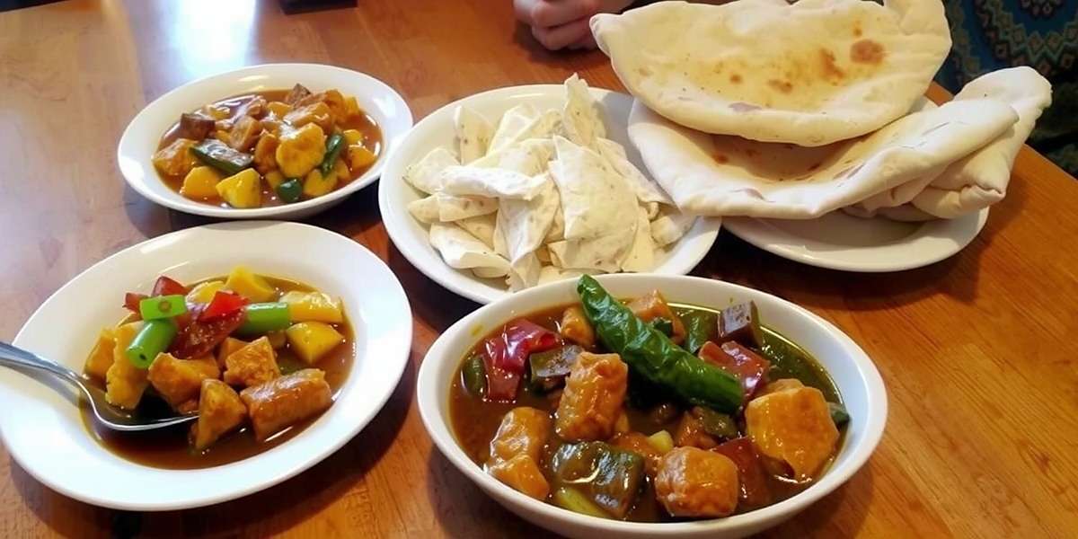 Curry Conquest Spice Route Northern India Cuisine Curry Conquest Spice Route Northern India dishes including butter chicken and naan bread